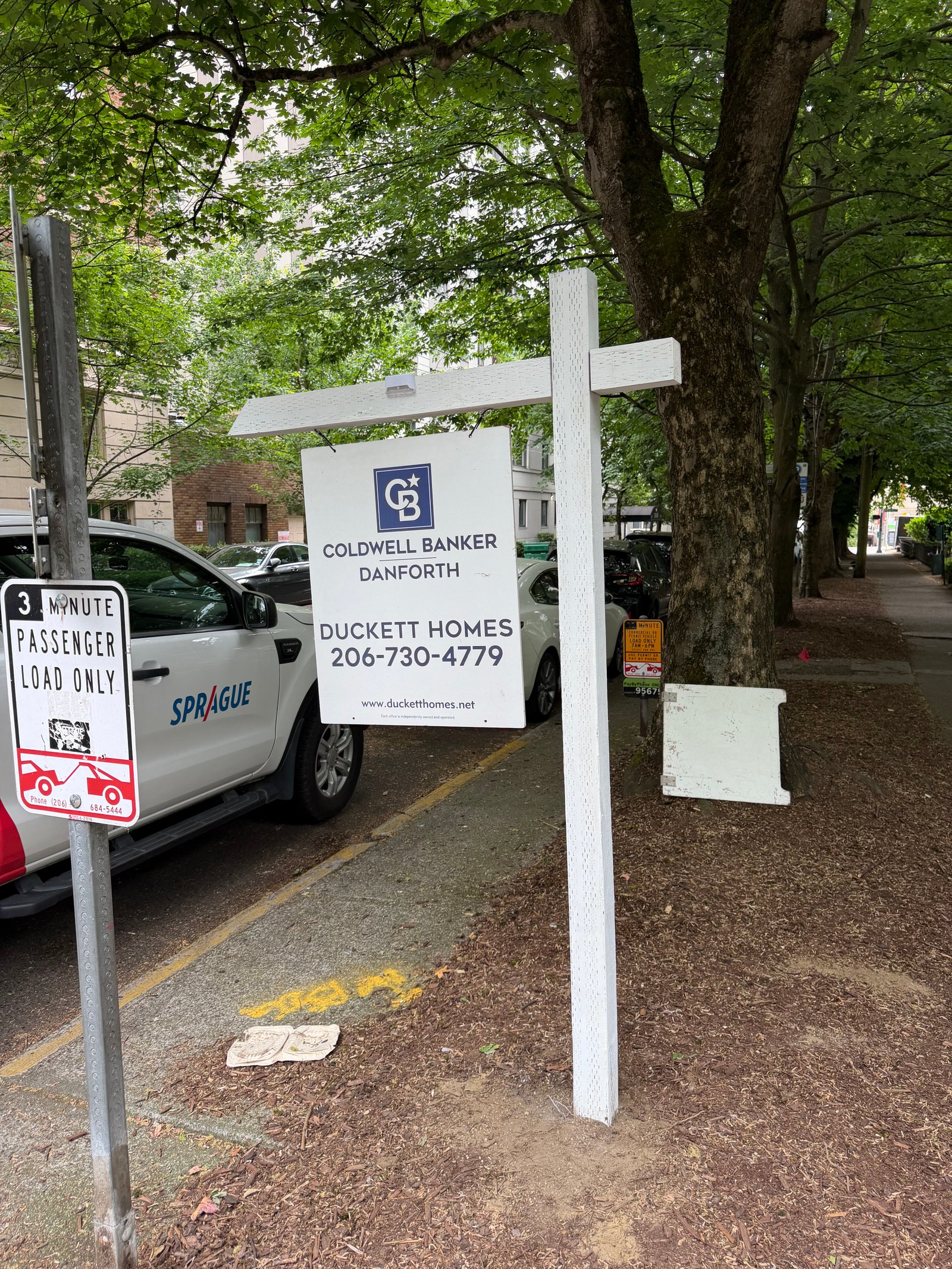 Real estate post and panel setup ready for new listing