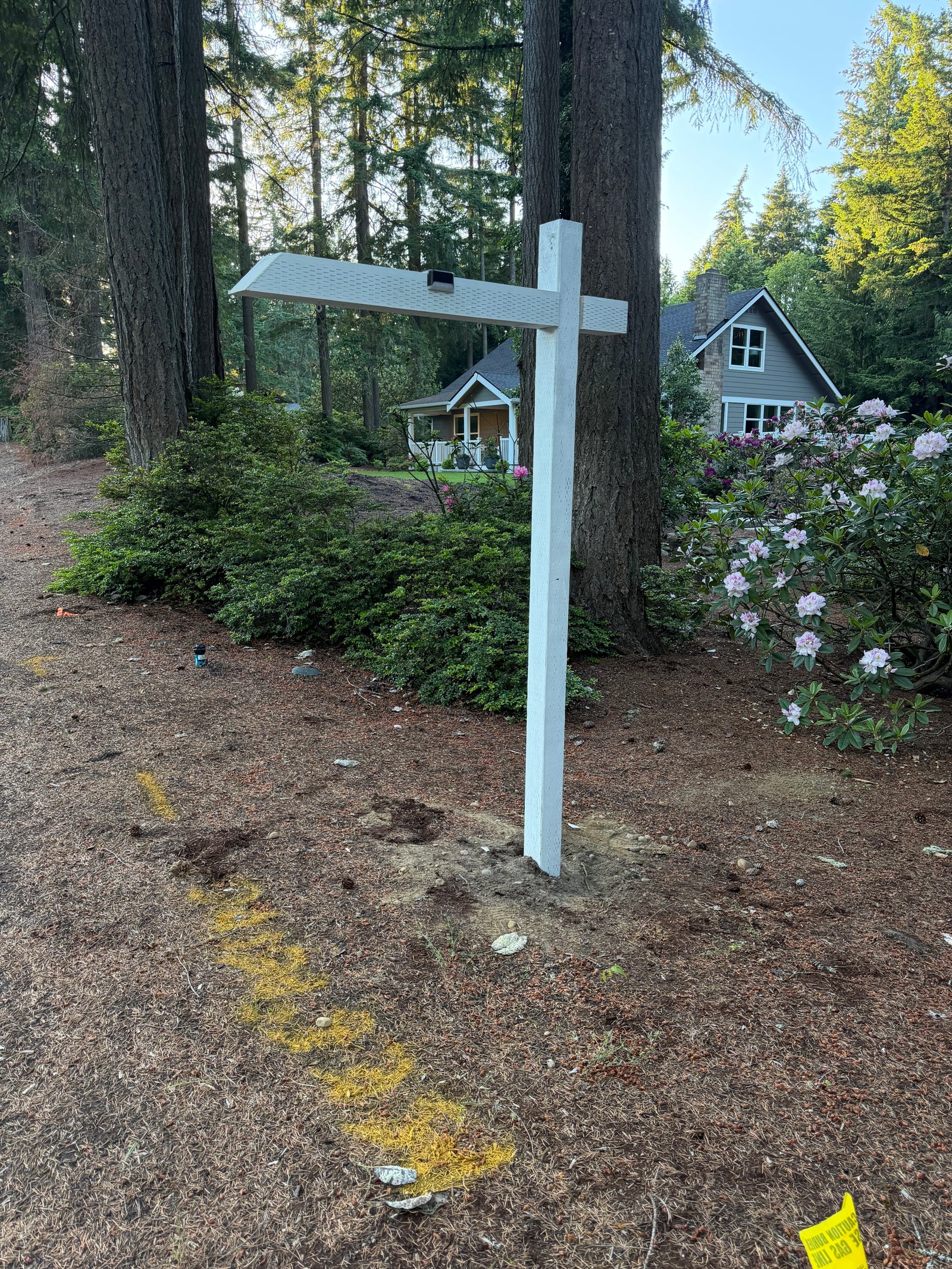 North Shore Sign Co installed sign in front of a modern home